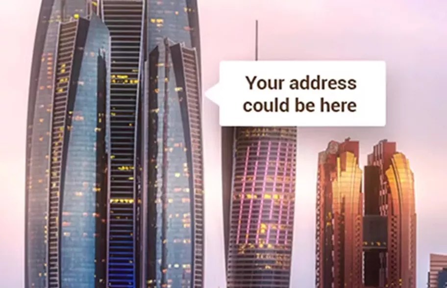 The iconic Etihad Towers in Abu Dhabi, a stunning cluster of sleek skyscrapers standing prominently beside the lavish Emirates Palace, beautifully illuminated under a pastel evening sky.