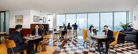 Premium coworking space in Emirates Towers, Dubai were everyone is working in a collaborative workspace 